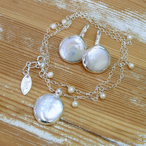 Pearl Earrings.
