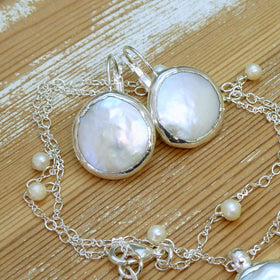 Pearl Earrings.